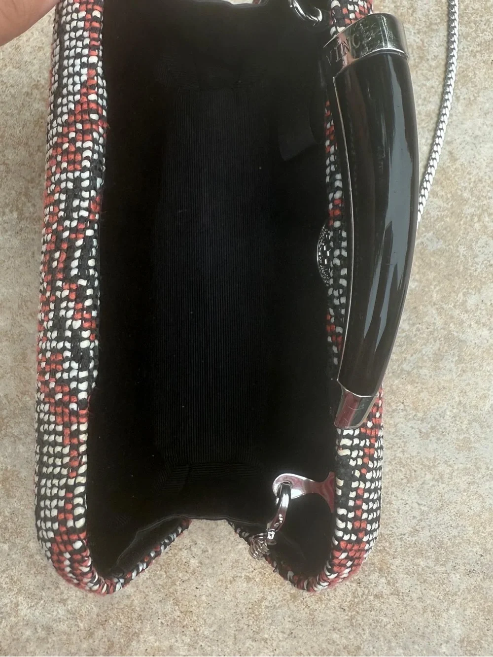 Vince Camuto textured clutch bag with a crossbody chain